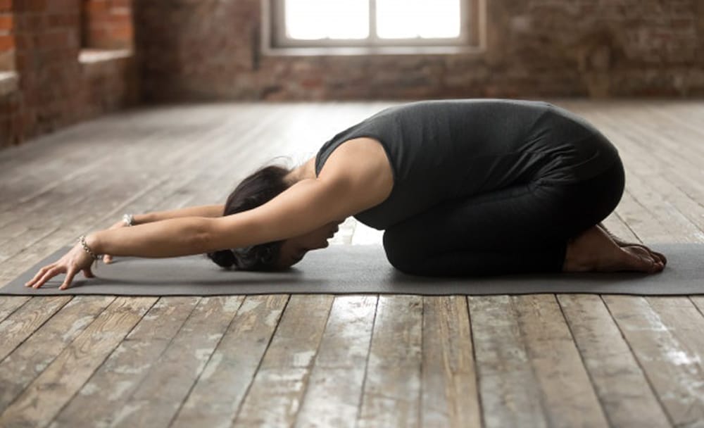 8 Yoga Poses To Do Post Dinner For A Good Night's Sleep